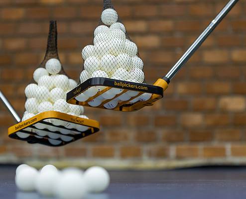 table tennis ball pickers with full of balls